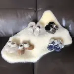 Babyschuhe aus Lammfell mit Strickbündchen